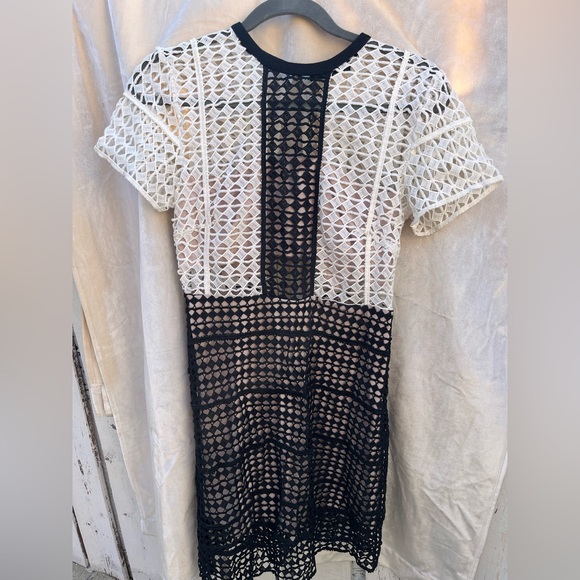 Never worn/ New cocktail dress with laser-cut holes throughout - Picture 2 of 2